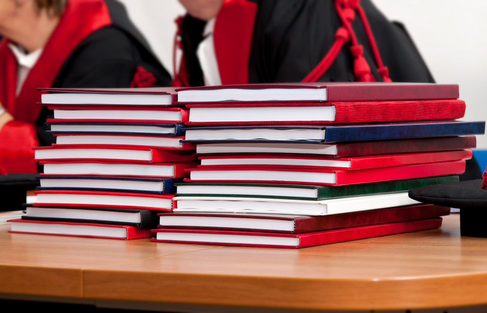 Stack of Dissertations on the Table